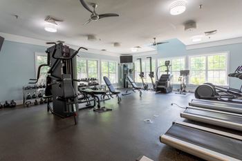 A spacious gym with treadmills, elliptical machines, and other exercise equipment.at Riverview Landing @ Valley Forge, Eagleville, PA